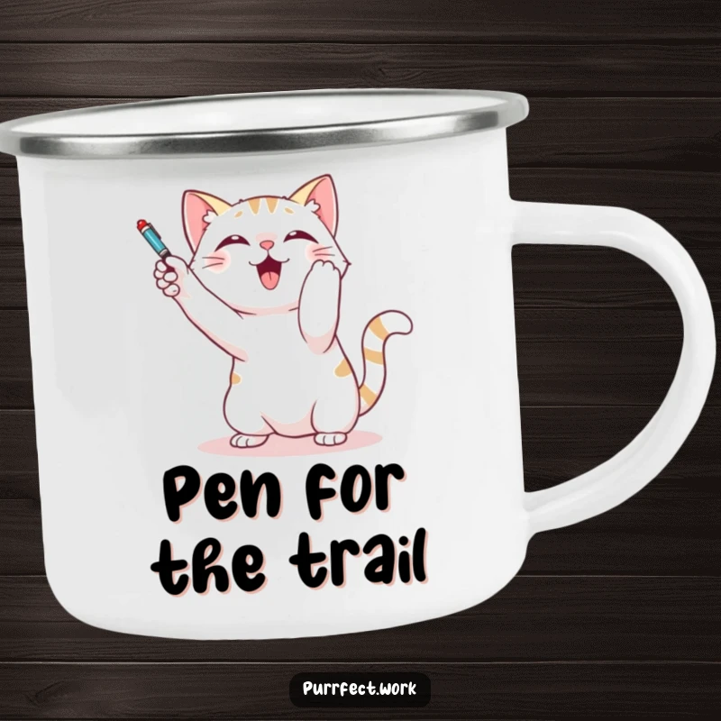 Funny camping mug featuring a cat playfully batting at a dangling pen, bringing playful energy to outdoor settings.