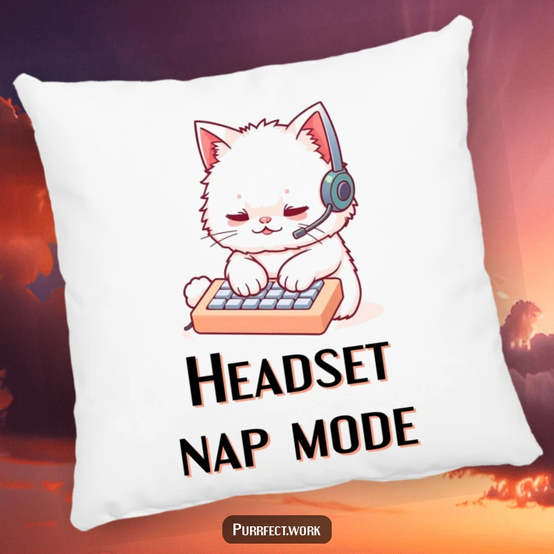 Funny cat wearing a headset and typing on a miniature keyboard, depicted on a soft decorative pillow. Cozy and humorous tech accent.