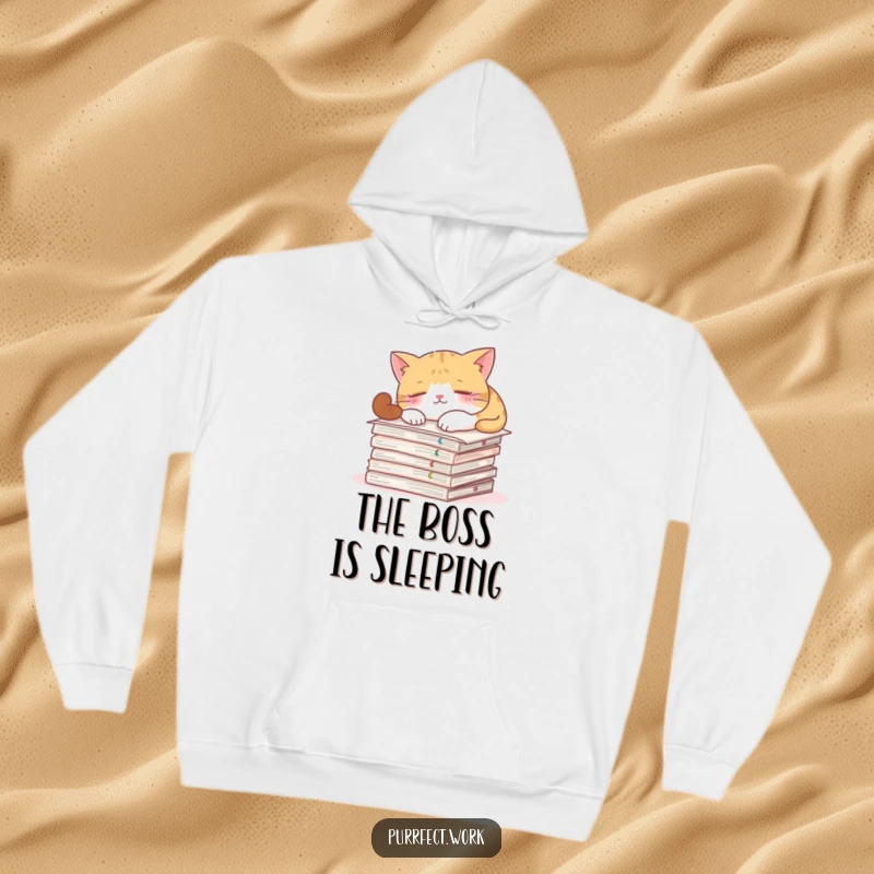 Funny hoodie featuring a cat sleeping on important documents, embodying cozy authority and playful laziness.