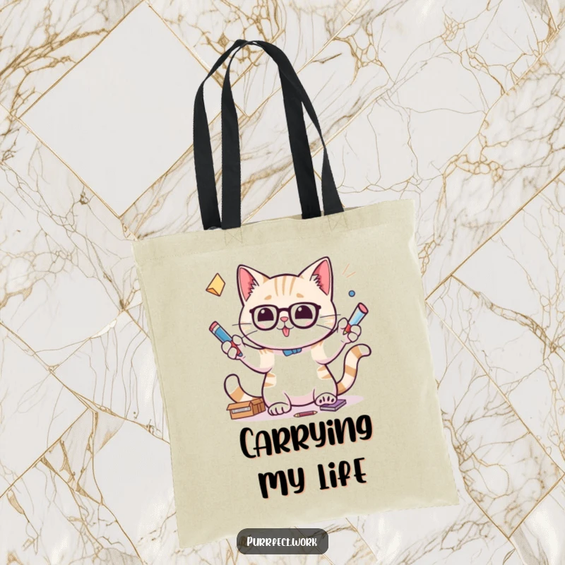 Funny tote bag with a cat focused on juggling office supplies, representing excellent multitasking abilities.
