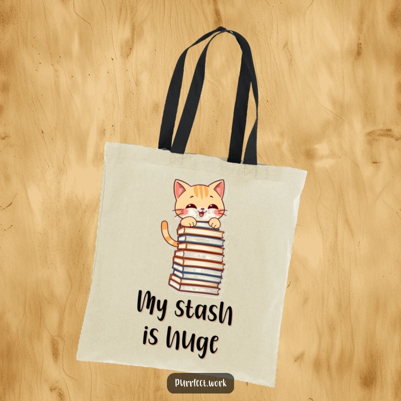 Funny tote bag with a mischievous cat grinning while climbing a stack of files, perfect for shopping or carrying books.